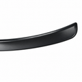 Close-up of the curved end and raised edge of a black wheel arch protector