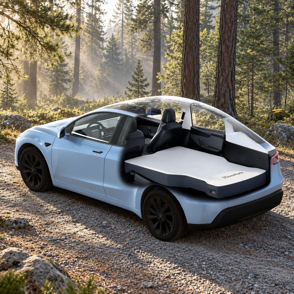Illustration of a white NovaPads mattress in the rear cabin of a light blue Model Y at a forest campsite.