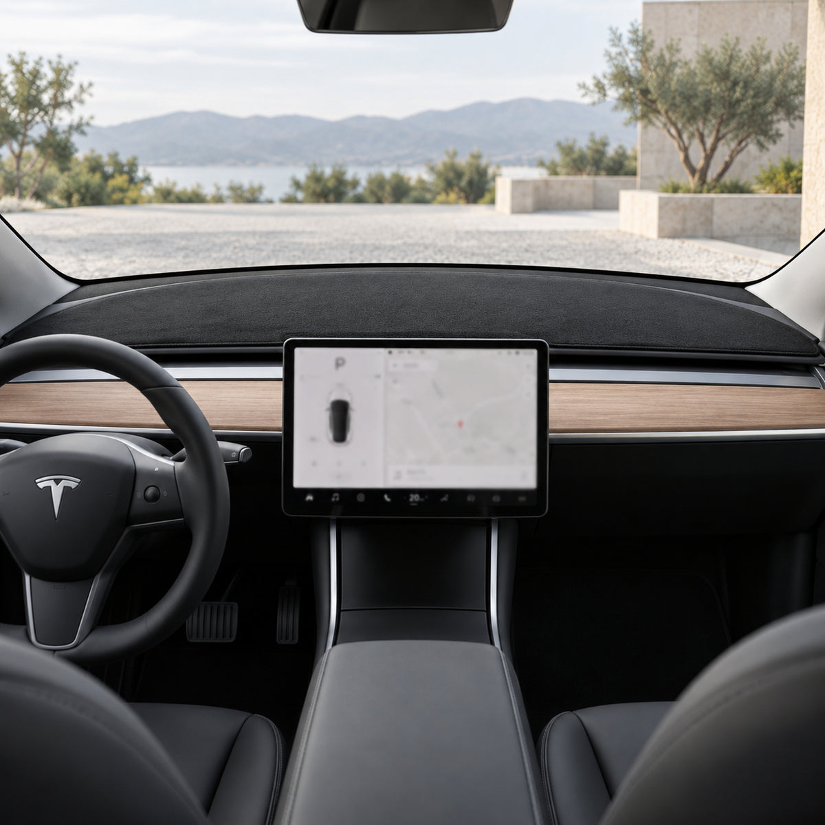 Black flannel front dashboard mat fitted in a legacy left-hand-drive Tesla Model 3 with the original wood dashboard trim.