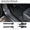 Black interior door sill guard installed at a Tesla Model Y Juniper front doorway, with the four-piece front and rear guard set below.