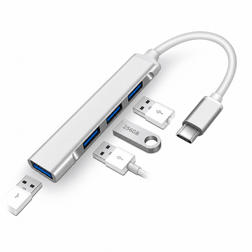 Silver four-port USB hub with a short USB-C cable, blue USB-A sockets and small connected-device examples on white.