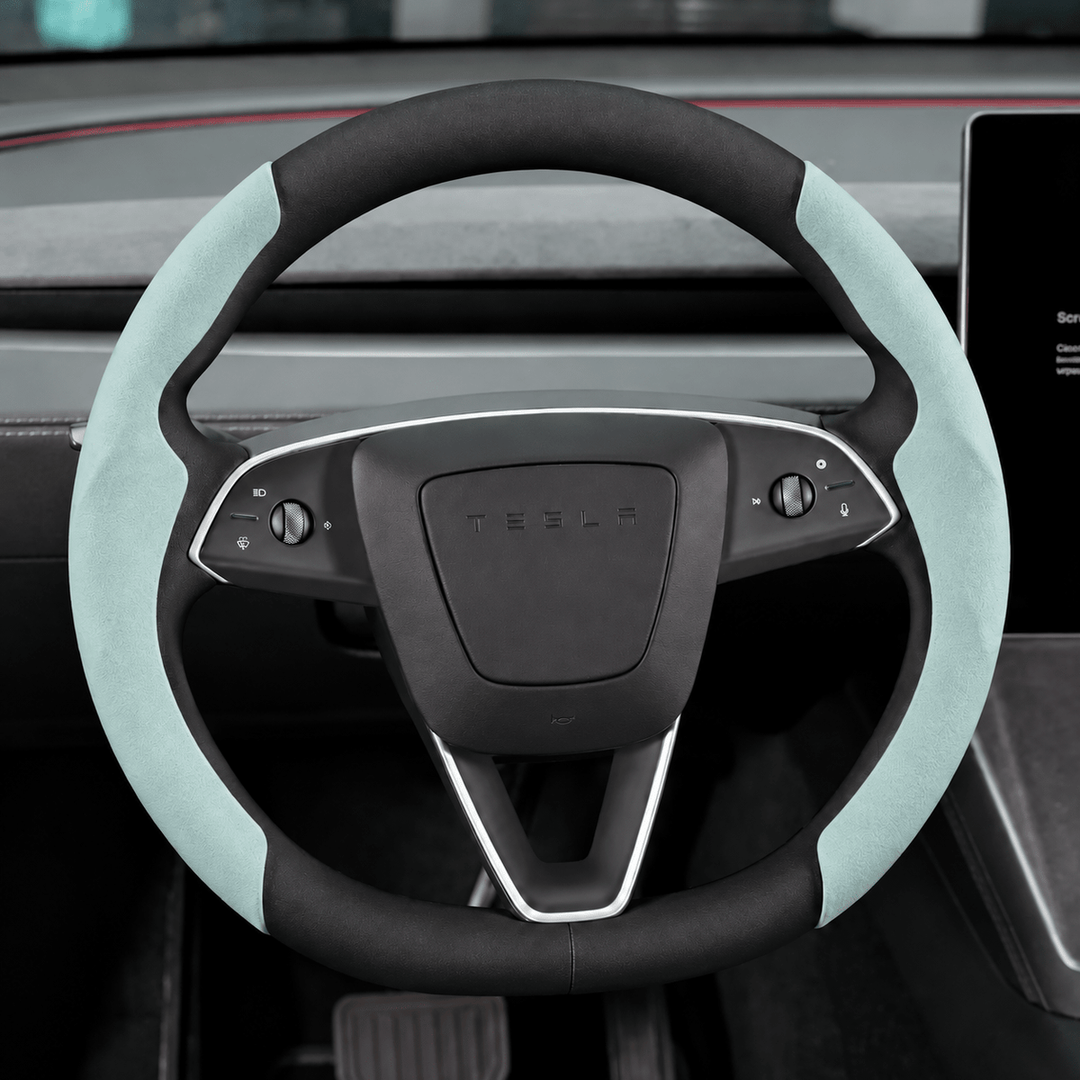 Light blue Alcantara grip covers fitted to both sides of a Tesla steering wheel