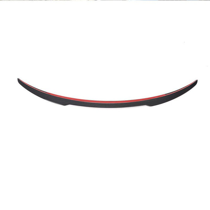 Underside of the Model Y carbon fiber spoiler showing the pre-applied adhesive strip